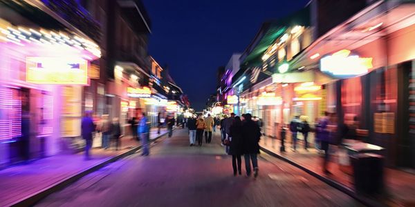 Vibrant neon city street at night